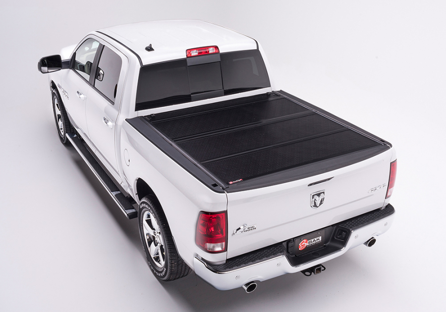 BAK INDUSTRIES BAKFLIP F1 HARD FOLDING TRUCK BED COVER - RAIL MOUNTS NEAR TOP OF BED RAIL - 1996-2004 TOYOTA TACOMA 6' 2" BED - 772403